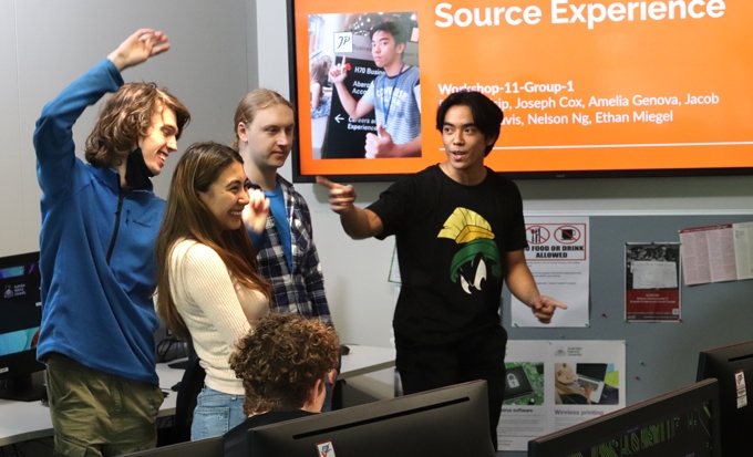 ANU computing students Jacob Weston-Davis, Amelia Genova, Ethan Miegel, and Philip Caisip share their adventures as open-source coders in a COMP2120 lab session.
